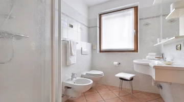 One bedroom bathroom with shower box
