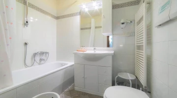 Private bathroom with shower tub