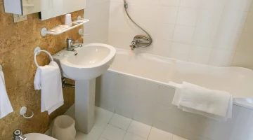 Private bathroom with bathtub