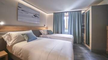 Chambre double avec lits simples