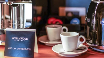 Electric kettle and coffee machine in the room