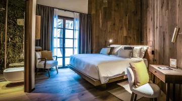 Room with desk and bathroom