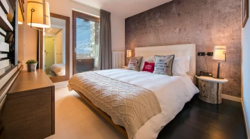 Camera matrimoniale in suite familiare