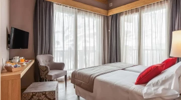 Stanza matrimoniale in una suite