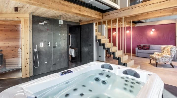 Vasca idromassaggio e sauna in suite