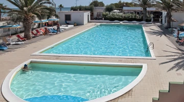 Outdoor swimming pool with children&#39;s pool