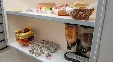 Cereals, fruit and yogurt for breakfast