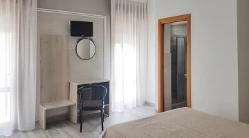 TV and desk in the room