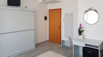 Desk and foldaway beds