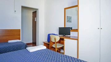 Room with TV and desk