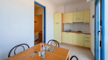 Cucina in stanze comunicanti