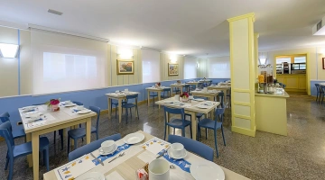 Tables set in the breakfast room