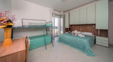Chambre double avec lits superposés