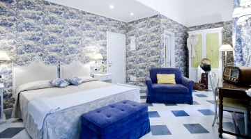 Camera matrimoniale con poltrona