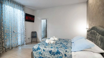 Double bedroom with TV