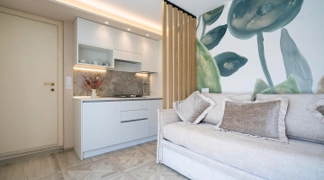 Séjour avec kitchenette dans une petite villa