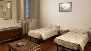 Chambre avec deux lits