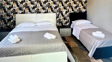 Zimmer mit drei Betten