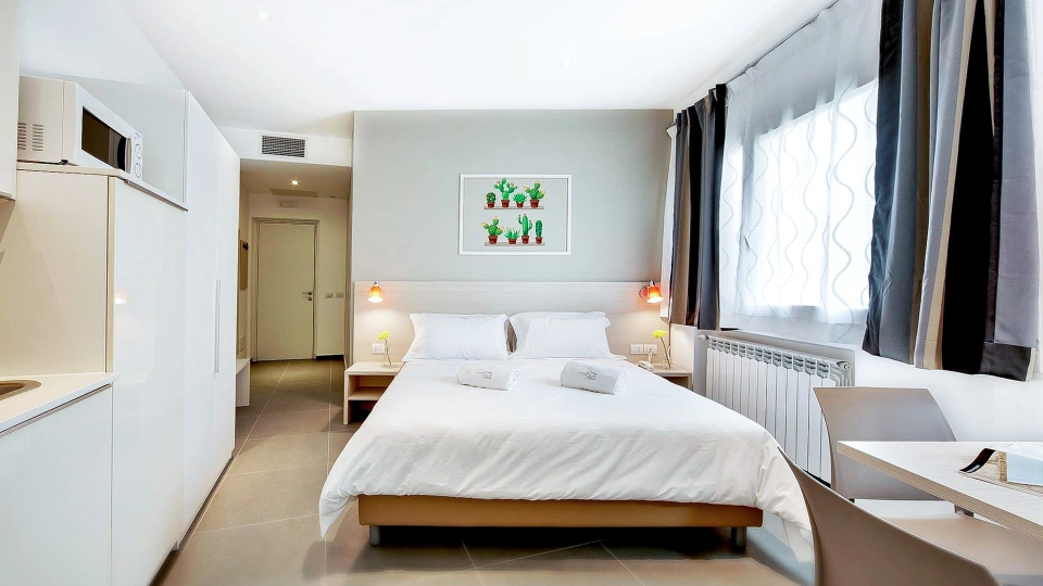 Appartamento con letto e angolo cottura