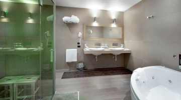 Bagno privato con vasca idromassaggio in Suite
