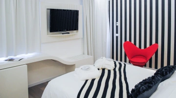 Camera matrimoniale con TV in Suite