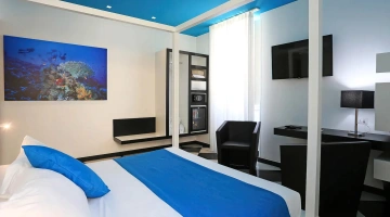 Camera con letto matrimoniale e TV