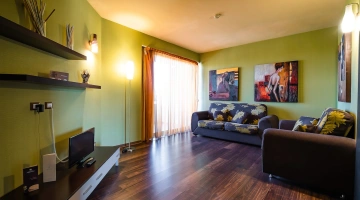 Soggiorno con TV in Suite