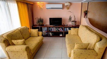 Salotto comune con TV