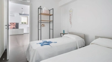Chambre double avec lits simples