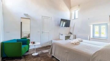 Chambre double avec fauteuil