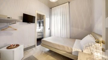 Camera con TV satellitare e bagno