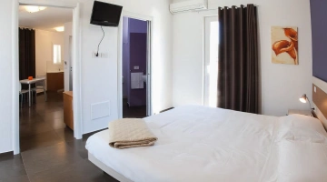 Camera con bagno in appartamento