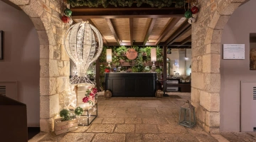 Entrée du restaurant I Cortili