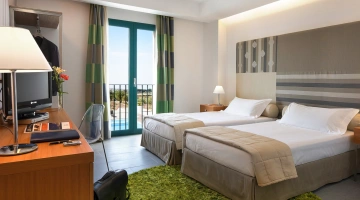 Chambre double avec lits simples