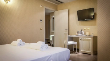 Room with TV and desk