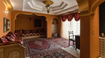 Suite with balcony and sitting area