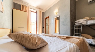Camera familiare con balcone