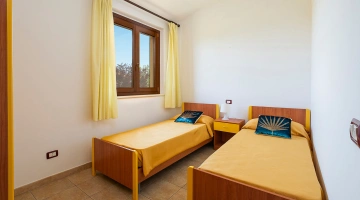 Zimmer mit zwei separaten Betten