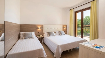 Zimmer mit drei Betten