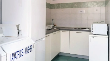 Lavatrice e cucina comune