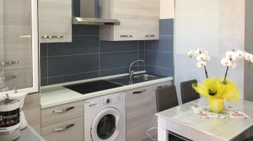 Cucina con lavatrice