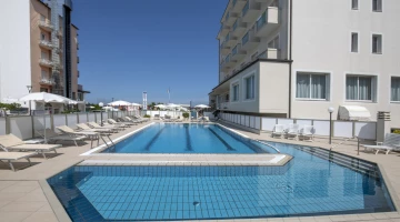 Heated swimming pool with hydromassage, shallow area for children