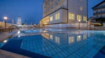 Heated swimming pool with hydromassage, shallow area for children