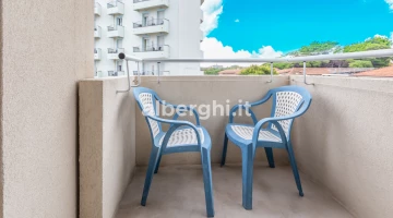 Balcony room with side sea view
