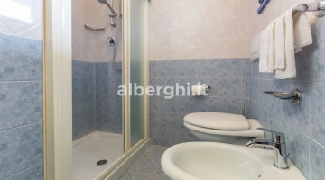 Bathroom with side sea view