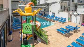 Heated swimming pool with slides and children's games