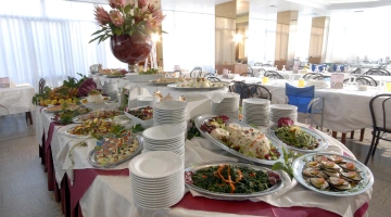 Restaurant room - buffet with assorted appetizers and vegetables