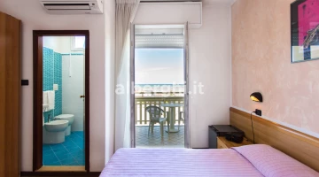 Camera perla balcone fronte mare