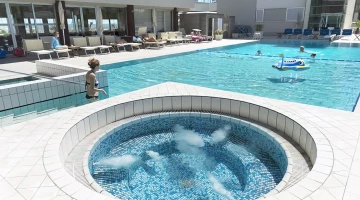 Outdoor hot tub in the pool area