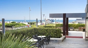 Garden terrace furnished with lounges and splendid view